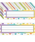 Colorful Dot Desk Nameplates Set 9.5x3 Inches For Kids Classrooms, 48 Pcs Confetti Watercolor Manuscript Name Plates displayed in stack.