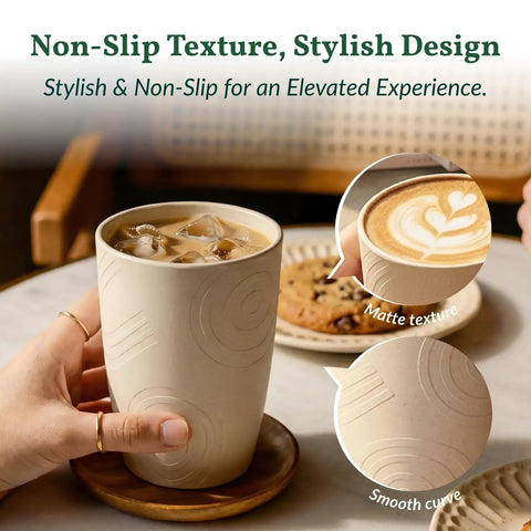 Close-up of Eco Friendly Wheat Straw Cups Set Unbreakable Drinking Glasses with matte texture and latte on table.