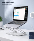 Go To Adjustable Aluminum Laptop Stand For Desk supporting a laptop next to a keyboard, perfect for ergonomic office setup.