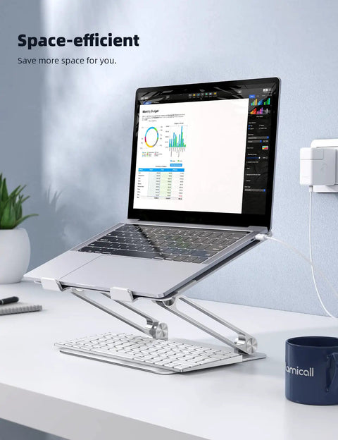 Go To Adjustable Aluminum Laptop Stand For Desk supporting a laptop next to a keyboard, perfect for ergonomic office setup.