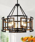 Twenty Inch Five Light Farmhouse Chandelier Featuring Walnut Wood And Matte Black Metal in a cozy kitchen setting.
