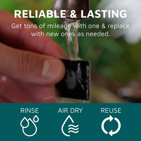KUVRD Waterbear single patch universal screen cleaner, black square cleaning patch being rinsed under a faucet.