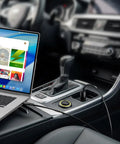 100W USB C Car Charger And PD Fast Power Adapter for laptops in car with USB-C cable connected to laptop
