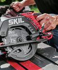 Heavy Duty Seven Quarter Inch Cordless Circular Saw Featuring Rear Handle And Brushless Motor Provides Killer Cuts Through Lumber; close-up of saw blade and handle.