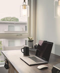 Studio 5 Mini Pendant Light With 60W Max above desk, painted bronze and brass finish, modern design, natural lighting