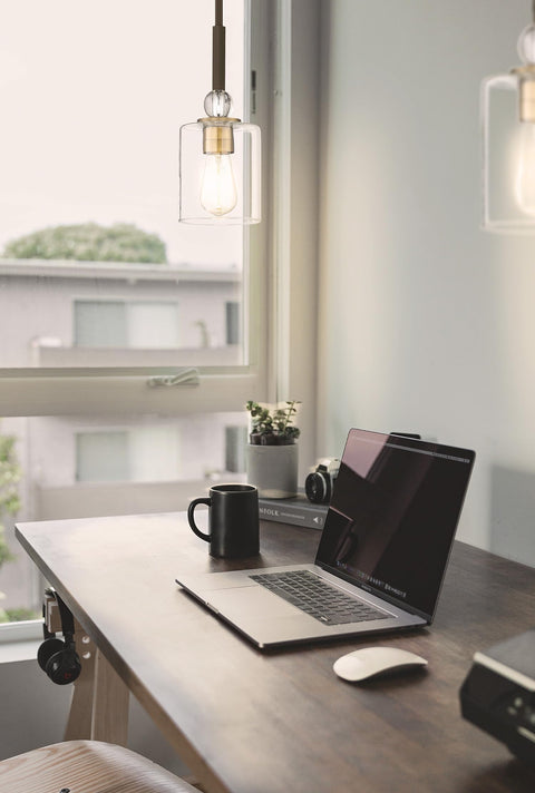Studio 5 Mini Pendant Light With 60W Max above desk, painted bronze and brass finish, modern design, natural lighting