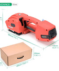 Hustle Free Electric Strapping Machine With Bright Digital Display And Massive 4000 Mah Battery Handles Half To Five Eighths In Poly Straps No Sweat Compact Cordless Bundler For Wood Metal Crate Packing next to a cardboard box for scale.