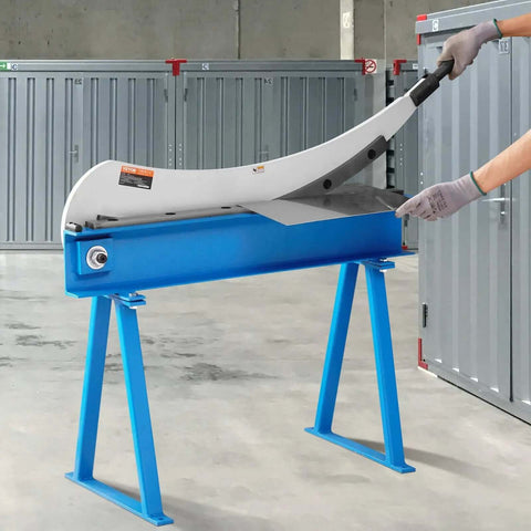 Beefy Hand Plate Shear 31.5 Inch Max Cutting Length Manual Sheet Metal Cutter with T10 high hardness blades shown in a workshop setting