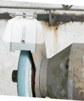 One Pair Bench Dust Guard Plates With Transparent Eye Shield Kit installed on a grinding machine for safety.