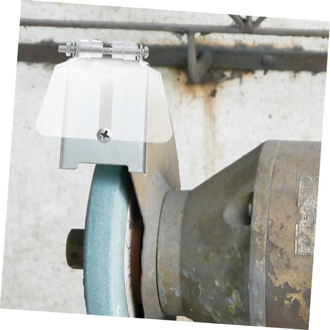 One Pair Bench Dust Guard Plates With Transparent Eye Shield Kit installed on a grinding machine for safety.