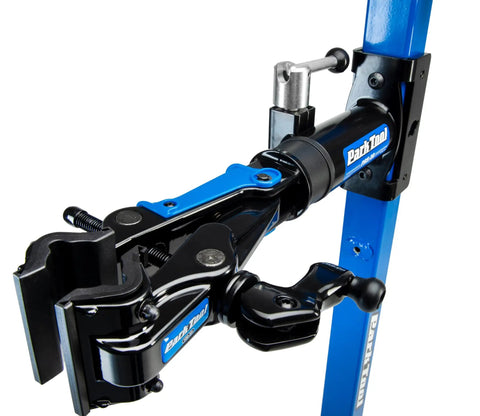 Close-up of Mechanical Lift Bicycle Repair Stand For E Bikes, Cargo Bikes, And MTB, 120 Lb Capacity, blue metal clamp.