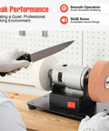 Mini Bench Grinder 96W, 7 Speed Adjustable Electric Tool With 3000 To 6000 Rpm Range Forward Reverse Switch And Smooth Operator Design Built Tough For Diy Hustles And Precision Sharpening Tasks, showing knife sharpening in use.