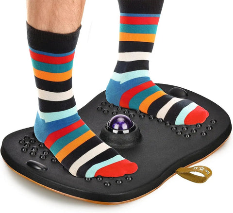 Person using Wobble Board With Massage Ball For Standing Desk Anti Fatigue Foam Pad And 19 Inch Balance Mat on wooden floor.