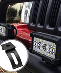 Heavy Duty Light Bar Mount Bracket For Trucks And SUVs, Sliding LED Light Bar Base Mounts close-up on vehicle with lights attached.