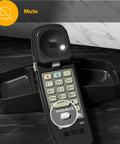 Close-up of Straight Up Reliable Trimline Corded Landline Phone showing mute button and backlit keypad in black case.