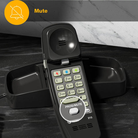 Close-up of Straight Up Reliable Trimline Corded Landline Phone showing mute button and backlit keypad in black case.