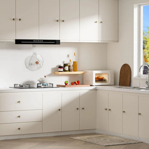 Modern kitchen with installed Dope Crystal Cabinet Knob Set, 8 Pack Glass Crystal Vintage Hardware In Antique Brass Bronze Finish.