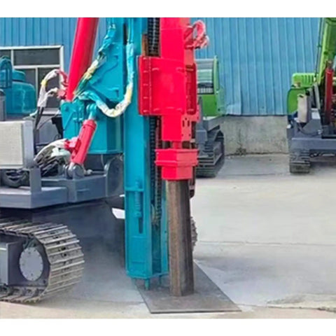 Beefy Hydraulic Guardrail Pile Driver Machine for Post Installation in action on concrete surface