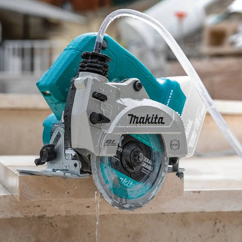 18V Cordless Wet and Dry Masonry Saw With Beefed-Up Brushless Motor, AWS Capable, 5-Inch Cutting in action on stone.