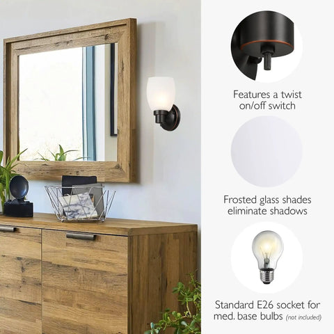 Oil Rubbed Bronze Wall Sconce With Frosted Glass Shade Dimmable Twist On Off Switch Up Or Down Mounting Ideal For Hallways Foyers And Bathrooms Compact 9.63 Inch Tall Lighting With Classic Modern Style next to mirror and wooden cabinet.