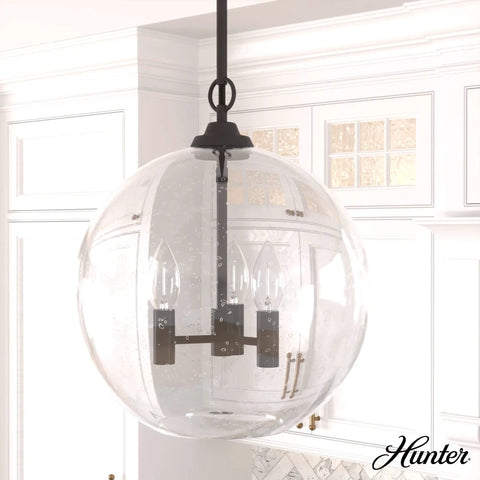 High Oaks 3-Light Noble Bronze Pendant Light With Dimmable Fixture, Dope Globe Seeded Glass Shades against kitchen backdrop