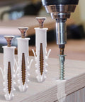 Set Of 100 White Plastic Wall Expansion Anchors 2.5 By 0.7 Cm Hollow Wall Plugs for drywall installation shown with drill