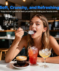 Woman enjoying drinks with soft chewable ice from Countertop Nugget Ice Maker Makes Forty Eight Pounds Per Day With Instant Freeze Speed And Zero Stress Cleaning Whips Up Smooth Chewable Pellets For Legit Chill Backyard Hangs.