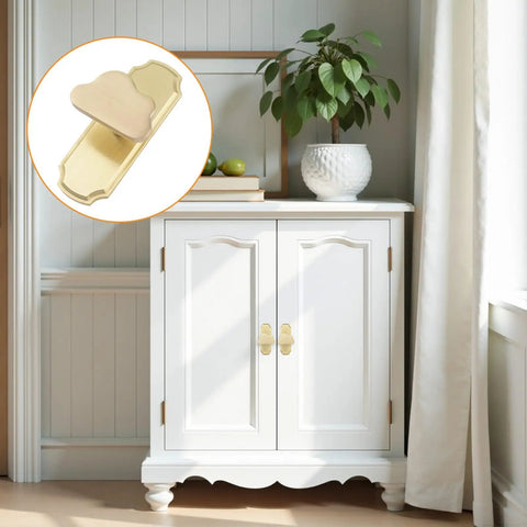 Gold Cloud Shaped Cabinet Knobs 6 Pack With Backplates shown on white cabinet with plant decor