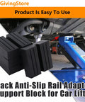 Heavy Duty Square Jack Pads With Anti-Slip Rubber Build For Safe Car Lifting And Pinch Weld Protection on a car lift, showing black rubber adapter blocks.