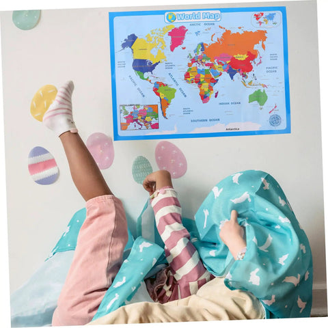Children playing under a colorful laminated world map poster for kid friendly wall decor educational geography chart. 60x45 cm.