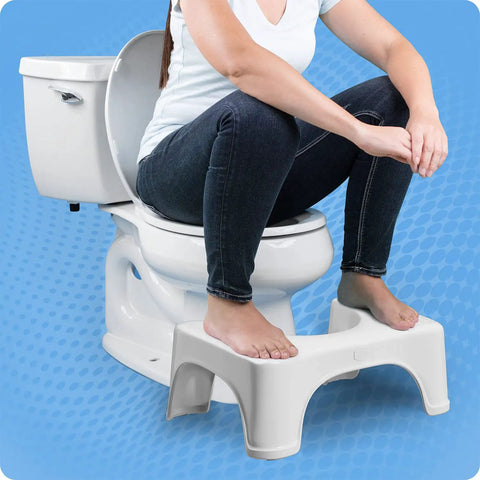 Person using Moonlight 7 Inch Toilet Stool With Motion Activated Night Light for Standard Toilets, elevates comfort, white stool