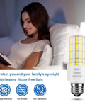 Woman reading by bedside lamp with Two Pack 30W LED Corn Light Bulbs, 3750 Lumen, 5000K Cool Daylight, Waterproof Outdoor Indoor, E26 E27 Medium Base, Replace 250W Incandescent, Energy Saving for Garage, Workshop, Backyard.