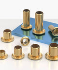 Top Shelf Pure Brass Hollow Rivet Eyelets For Leather And Heavy Duty Fabric Crafting, assorted sizes on blue surface.