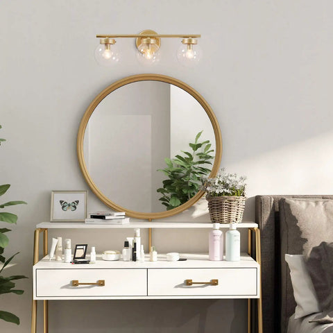 Hand Painted Vanity Light Fixtures With Clear Globe Glass Shades above modern bathroom vanity with mirror and plants