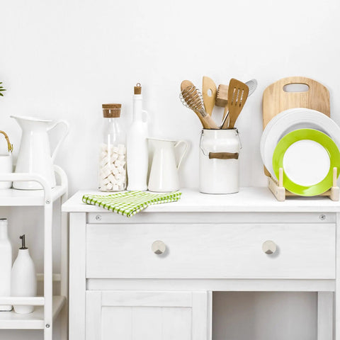 Brushed Nickel Round Cabinet Knobs Featuring Solid Zinc Construction And Easy Grip Design, 15 Pack displayed on white kitchen cabinet.