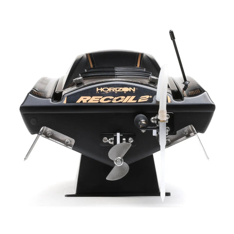 Rear view of Heatwave Recoil 2 V2 26 Self Righting Brushless RTR RC Boat with dual rudders and propeller visible
