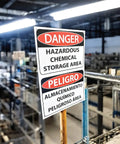 Hazardous Chemical Storage Area Sign Bilingual English Spanish Authorized Personnel Only OSHA 10x14 Inch Tough 80mil Plastic For Cabinets Containers Bins And Fencing, mounted in warehouse