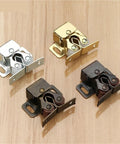 Magnetic Cabinet Door Stop Damper And Soft Close Latch for Wardrobe Furniture in various finishes on wooden background