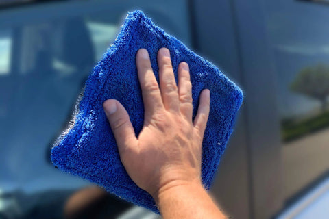 Autofiber Amphibian mini dual-side glass cleaning microfiber towel, 8x8 in, blue/gray, used to wipe car window.