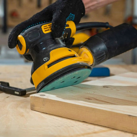 Heavy Duty 5 Inch Random Orbital Sander Replacement Pad 2 Pack Featuring Tough Pu Backing used on wood surface for precise sanding.