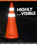 2 Pack 28 Inch Orange Collapsible Traffic Cones With Quick Pull Setup And Slick Fold Flat Storage, highly visible on a dark road.