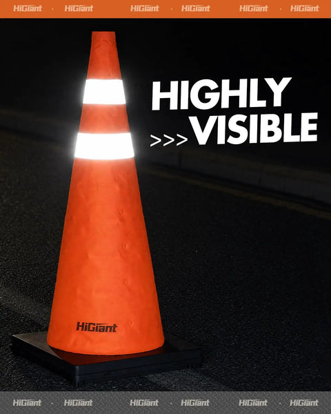 2 Pack 28 Inch Orange Collapsible Traffic Cones With Quick Pull Setup And Slick Fold Flat Storage, highly visible on a dark road.