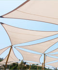 Heavy Duty Shade Sail Hardware Kit With Winches And Wire Rope Rust Free Stainless Steel Sun Shade Hardware Kit For Rectangle Square Triangle Shade Sail Installation 71 Pieces covering a patio.