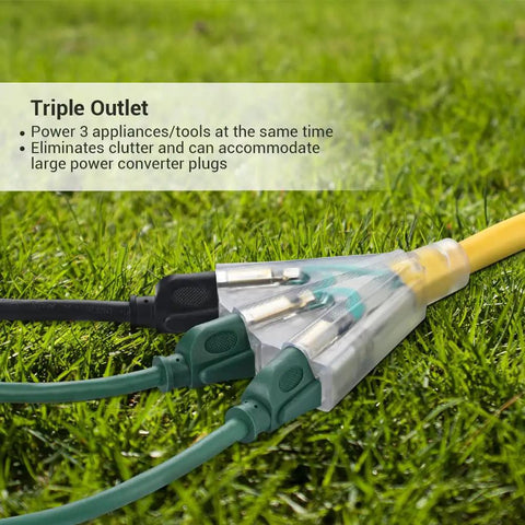 Heavy Duty 25 Ft Outdoor Extension Cord With Tri Tap 14 3 Gauge SJTW 15 Amp Power Cable on grass with triple outlet