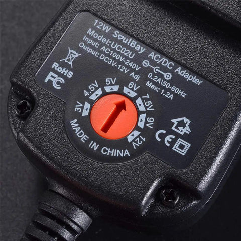 Close-up of 12W AC DC adapter's voltage selector for All In One 12W Universal AC DC Adapter With Eight Swappable Tips Power Supply From 3V To 12V 1.2A Max Plug And Play Charger For Small Electronics Like Cameras Routers Toys And More.