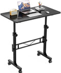32 Inch Portable Standing Desk On Wheels, Adjustable Height Sit Stand Desk For Small Spaces, Black, with laptop and accessories