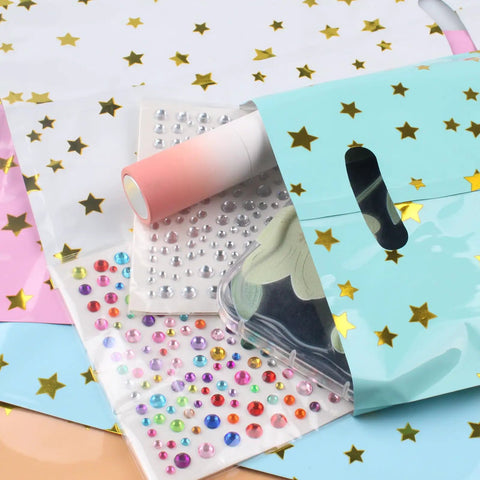 25 Party Favor Bags For Kids Birthday Parties With Star Pattern In 5 Colors showcasing contents and vibrant design