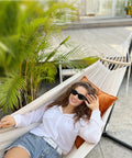 Garden Cotton Hammock With Spreader Bar For Patio And Backyard Ultra Comfortable And Strong Up To 450 Lbs, woman relaxing outdoors