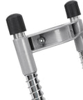 Close-up of handheld portable drill guides with 90 degree precision jig attachments, showing sturdy metal construction and design details.
