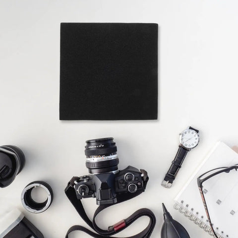 Black Foam Liner Packing Inserts For Protection And Impact Resistance shown with camera gear on white surface